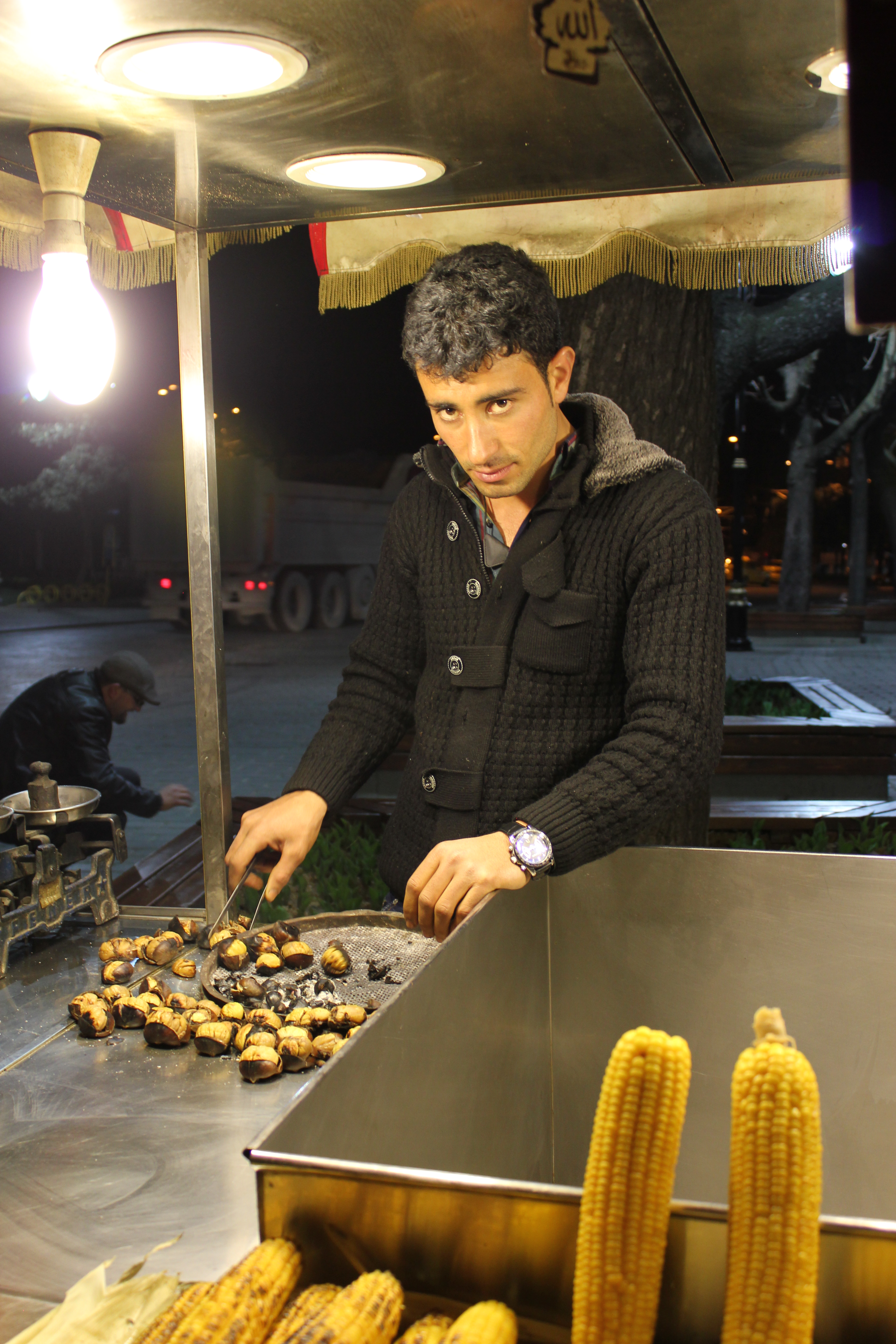 Cute Guy Roasting Chestnuts; Istanbul, Turkey; 2013